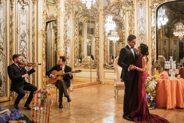 Adrian Delmer - A violinist and a guitar player performing for a surprise proposal inside the Crystal Room