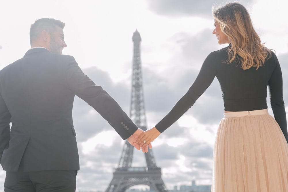 Couple holding hands and looking at each other