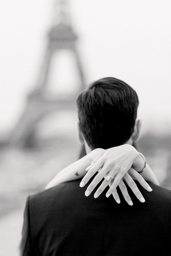 engagement in Paris - cute close-up of engagement ring and tatoo with airplane
