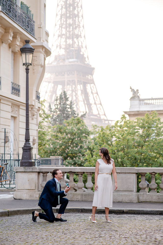 Kneeling with the ring on Avenue de Camoens