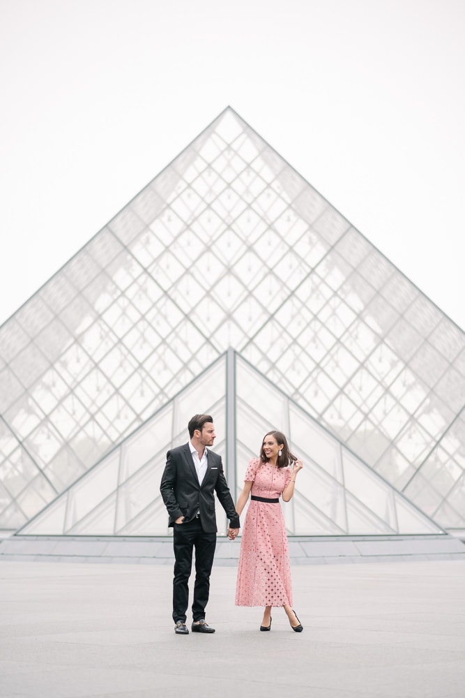 Posing ideas for couples - holding hands facing the camera and looking at each other