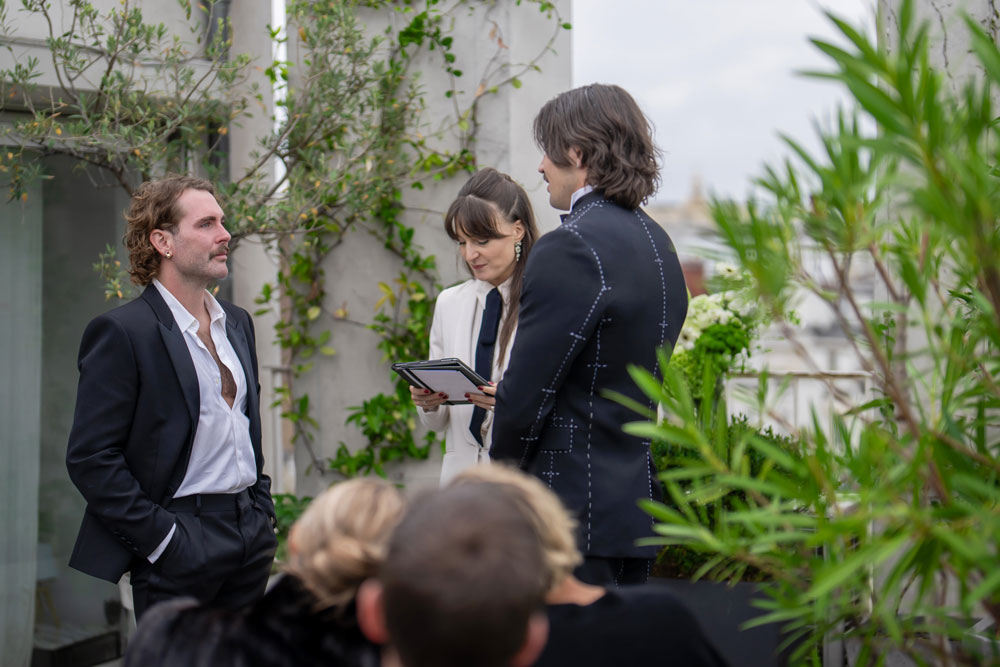 Couple in front of the elopement celebrant (same sex marriage in Paris)