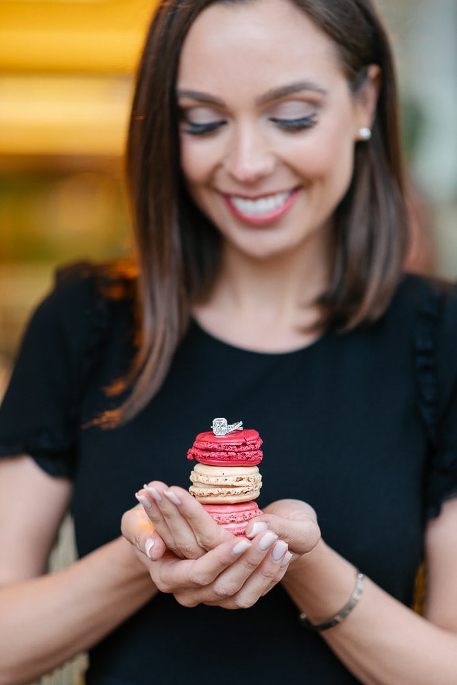 yes in paris and then engagement photos with diamond ring and macarons